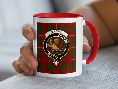 MacFie red tartan clan crest mug in hand — showing full tartan wrap and coloured handle