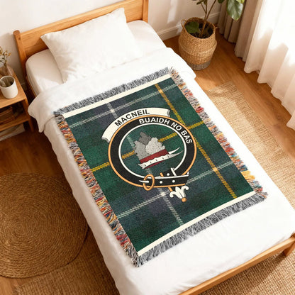 MacNeil Vincere Aut Mori clan crest woven into tartan blanket — cotton construction detail
