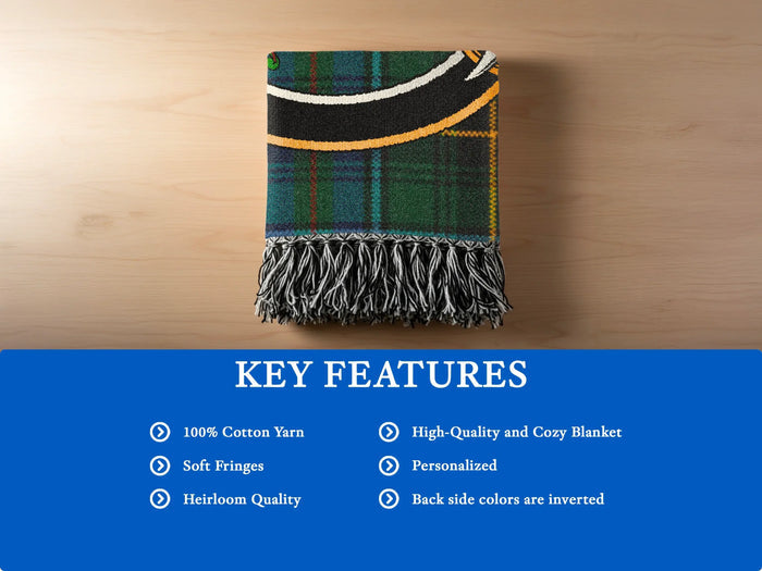 MacInnes tartan woven blanket in bedroom — 80x60 inch large heirloom size crest detail