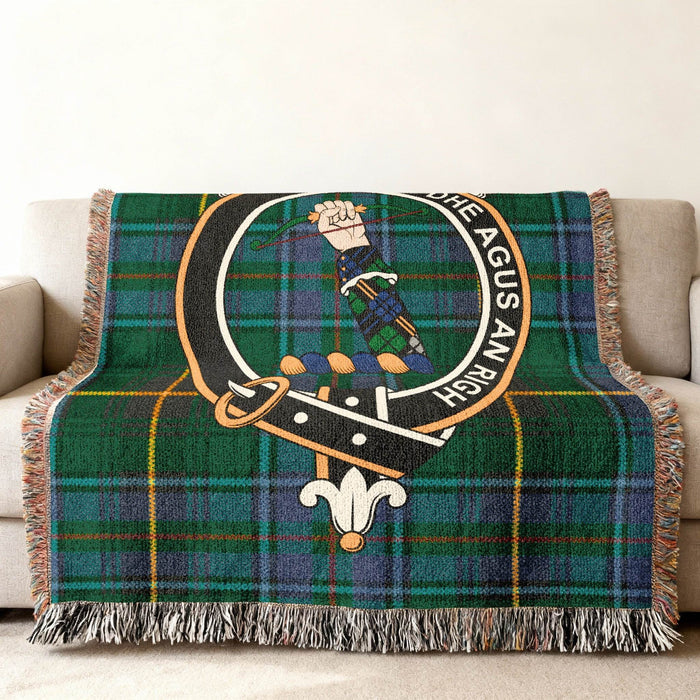 MacInnes Scottish tartan woven blanket laid flat — full crest and tartan pattern view