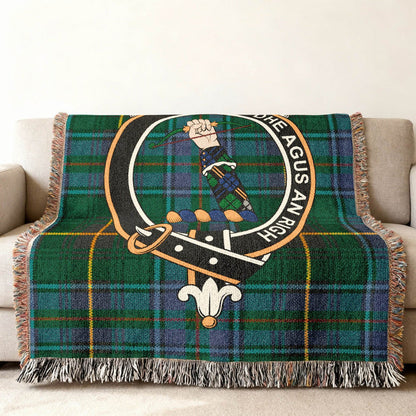 MacInnes Scottish tartan woven blanket laid flat — full crest and tartan pattern view