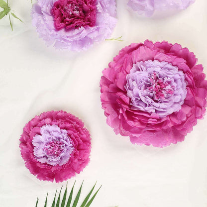 Pink and lavender paper flowers arranged on a light background.