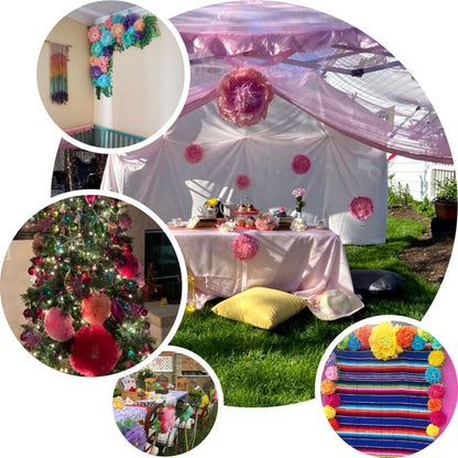 Colorful paper pom-poms decorate a festive outdoor event setup.
