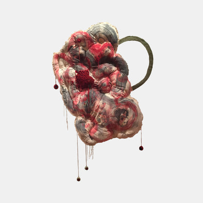 Study for Spiritual Interpretation of Artificial Object by Noriko Okada: Abstract monoprint on fabric featuring swirling organic forms in deep reds and grays, with dripping elements and suspended dark spheres. The composition suggests a floating, cloud-like structure with a curved green stem, rendered in a textural, ethereal style. 60x36 inches.